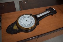 An early 20th Century barometer having brass presentation plaque for Bro H Bakes of the Endeavour