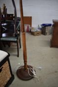 A traditional oak standard lamp