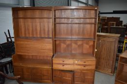 Two section of vintage Nathan teak wall including cocktail/bureau section