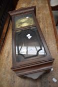 A traditional styled mahogany cased Metamec wall clock.
