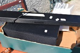 A LG soundbar and subwoofer