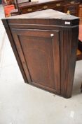 A 19th Century oak corner cupboard
