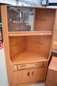 A vintage teak G plan corner display with drawer and double cupboard under