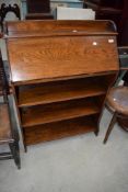 An early 20th Century bureau bookshelf in the Arts and Crafts style , of shallow proportions