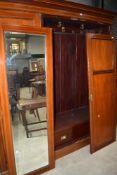 An Edwardian mahogany two piece bedroom suite having inlaid decoration
