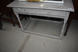 A shabby chic low side table