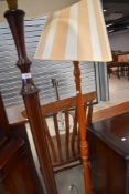 Two standard lamps, mahogany and stained frame