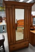 A late Victorian Aesthetic style two piece bedroom suite