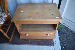 A modern natural pine TV or similar unit with drawer base, width approx. 66cm