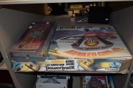 A vintage Matchbox 5000 banked curve powertrack, And a mid century Newfooty table soccer.