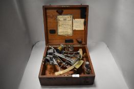 A vintage marine sextant in wooden box.