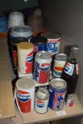 An assortment of retro Pepsi collectables to include Radio, money boxes and telephone.