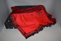 A 20th century Chanel designer scarf in red and black