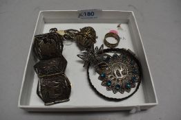 A selection of white metal filigree jewellery, comprising bracelets, brooches and one ring,