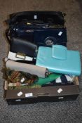 A selection of modern ladies fashion hand bags and a selection of printed silk scarfs