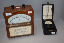 A vintage wooden cased Ameter and a Ferranti light tester.