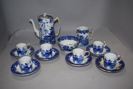 A Burleighware 'Willow' coffee set, comprising of six coffee cans and saucers, sugar, cream and