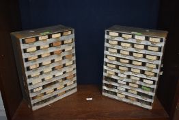 Two cabinets containing assorted fastenings, nuts, bolts, nails and screws etc.