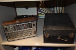 An early 20th century Colombia no.202 gramophone with a modern Retro club record player and a Selena