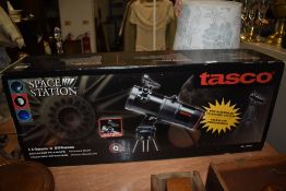 A Tasco pre-assembled telescope system.