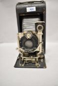 An Ansco Company folding camera with Modica Anastigmat 63/4 inch f7,5 lens No9959