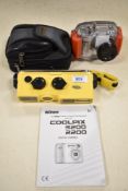 A Nikon Coolpix 3200 in weatherproof case and a Minolta Weathermatic camera