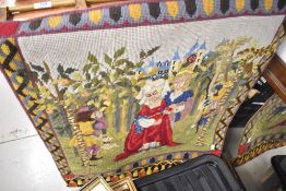 A wool work wall hanging with a fairy tale theme