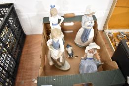 Four figurines by Nao