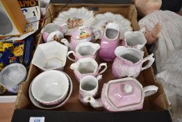 A selection of Victorian pink German lustre wares including teapots plates and jugs etc
