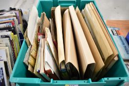 A selection of travel brochures and guides