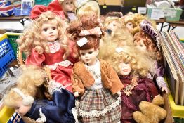 A box of vintage porcelain headed dolls