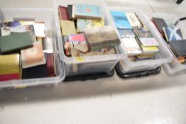Four boxes of mixed text and reference books