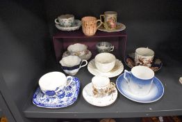 A selection of antique and later tea cup and saucer sets including Royal Copenhagen, Coalport and