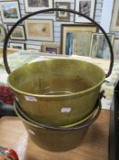 Two 20th century brass and cast jam pans