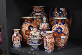 A selection of 20th century Japanese porcelain Imari wares including scalloped vase, pairs of vase