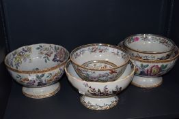 Five Victorian cream ware fruit bowls having footed bases with transfer printed and accented designs