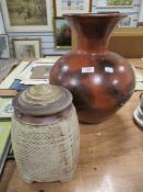 A 20th century Chris Lewis studio pottery lidded container with a large terracotta vase