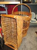 Two modern woven wicker baskets, one for logs and similar laundry basket