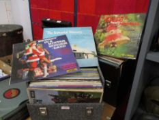 Two vintage vinyl record carry cases with an assortment of Lp's