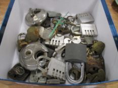 A selection of antique and later pad locks including brass examples most having keys