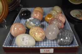A selection of 20th century semi precious stone and agate eggs