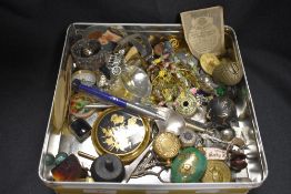 A selection of curios and trinkets including propelling pencils, snuff bottle and sovereign holder