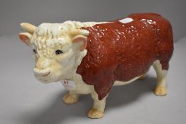 A 20th century ceramic shop display figure of a Hereford bull
