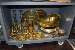 A good selection of antique and later brass wares including Indian embossed storage jars, bell sets,