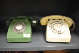 Two GPO telephone sets in green and cream
