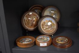 A selection of 19th century Pratt ware paste pot lids including Alas poor bruin and Bonny black