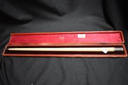 An early 20th century music conductors baton having wooden shaft with HM silver cap marked Yorkshire