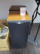 A pair of Bower and Wilkins DM602 speakers , and two speaker stands