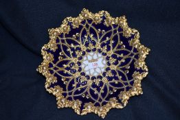 A Meissen marked bowl having ornate gilt ivy border over cobalt blue ground