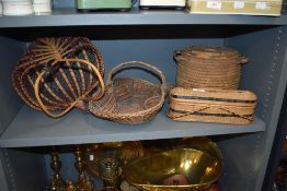 A selection of interesting 20th century wicker baskets and containers in various designs including